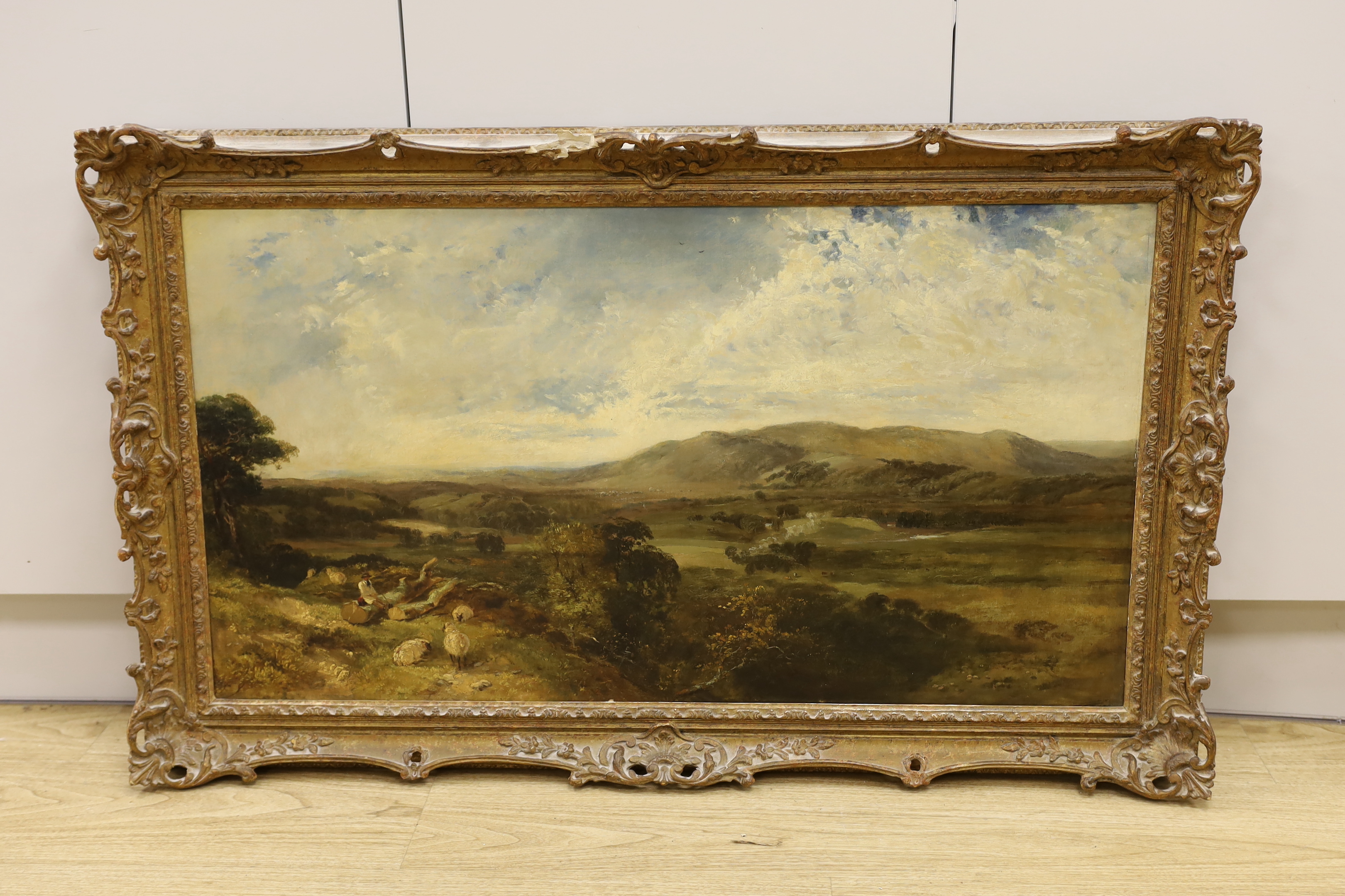 Victorian School, oil on canvas, Landscape with shepherd and sheep, 49 x 90cm, ornate gilt frame